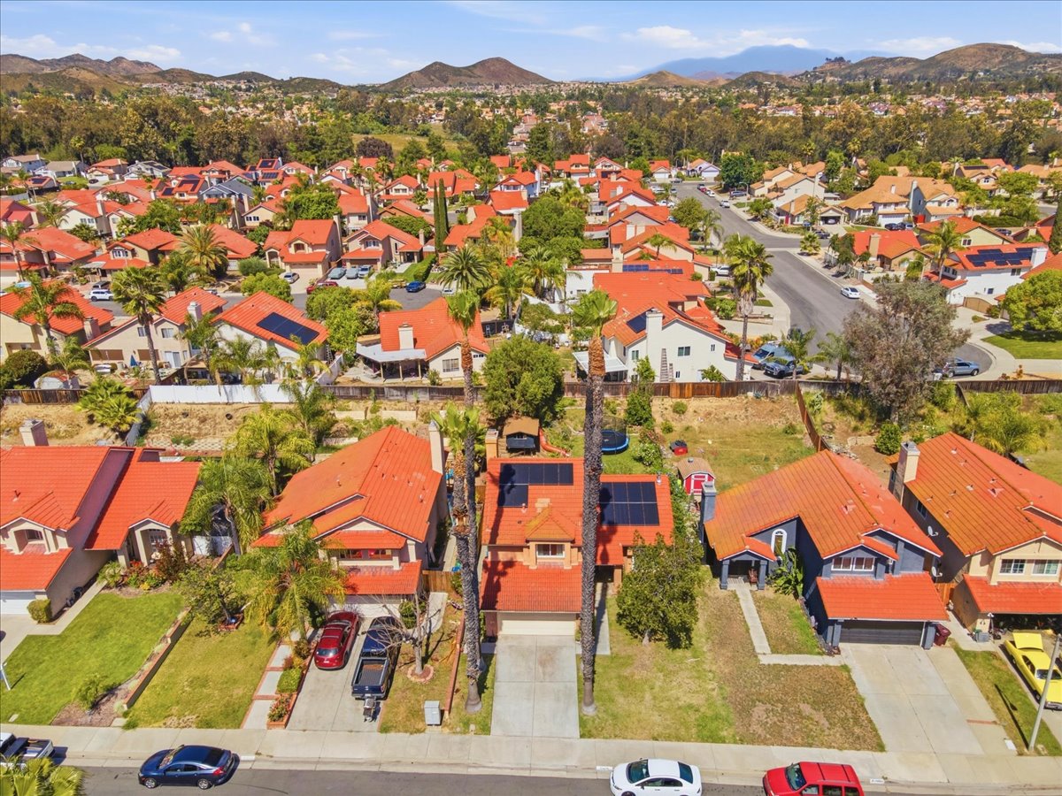Established Murrieta neighborhood surrounding 24570 New Haven Drive featuring tree-lined streets, well-maintained homes, and a desirable residential setting near parks, shopping, and local amenities.