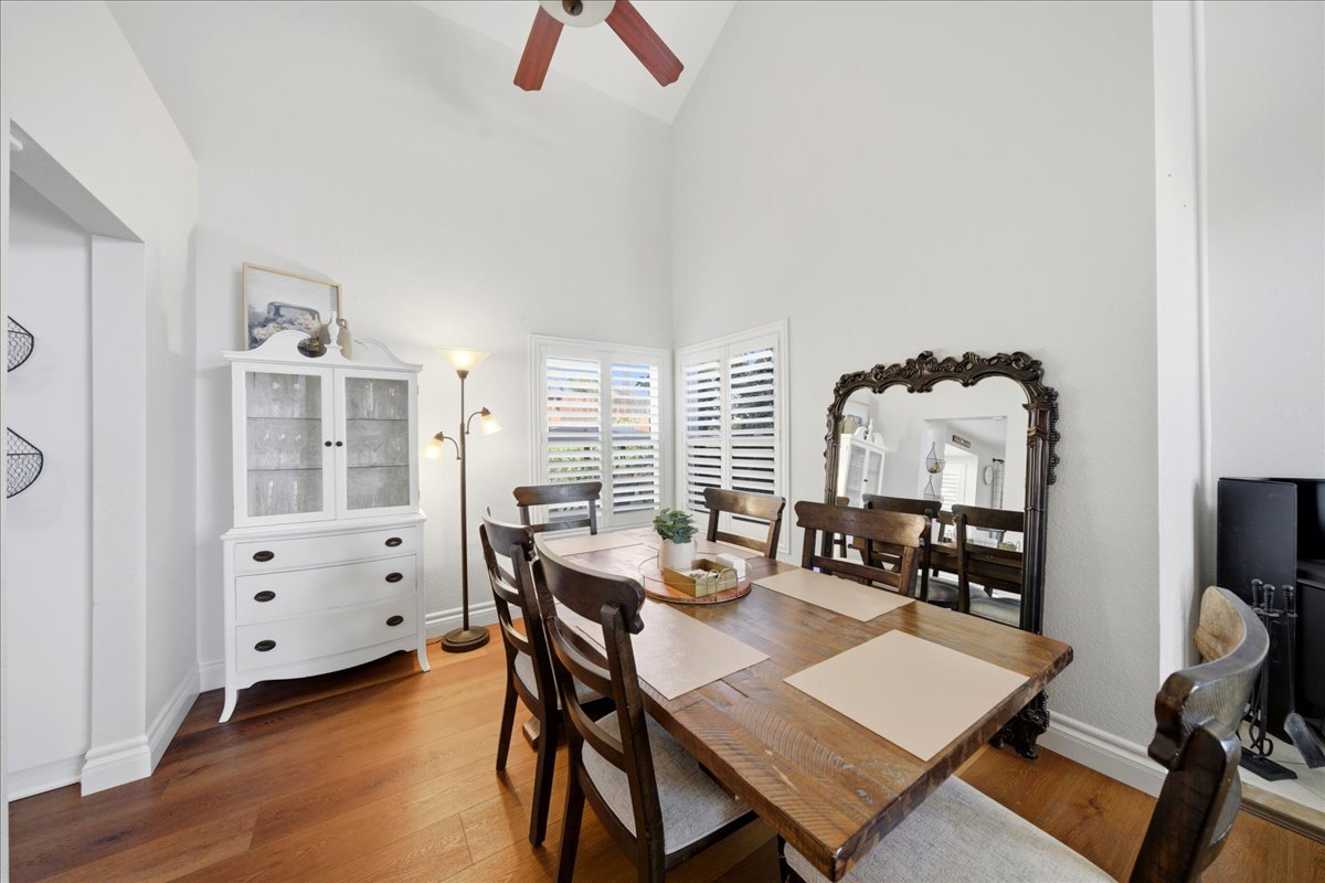 Open dining area connected to living space with natural light in Murrieta